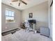 Office space with desk setup, gray accent colors, and lots of natural light at 5923 S Jamestown Ct, Aurora, CO 80016