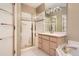 Modern bathroom with a glass-enclosed shower, sleek vanity, and bright lighting at 2700 W Riverwalk Cir # C, Littleton, CO 80123