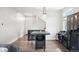 Dining room with dark furniture and stairs leading upstairs at 22025 E 45Th Ave, Aurora, CO 80019