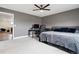 Spacious main bedroom with a computer area, ceiling fan and a large window allowing lots of natural light at 22025 E 45Th Ave, Aurora, CO 80019