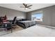 Main bedroom boasts natural light and a view of the neighborhood with a dedicated computer area at 22025 E 45Th Ave, Aurora, CO 80019