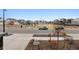 Neighborhood street view showcasing the community's well-maintained sidewalks and common green spaces at 22025 E 45Th Ave, Aurora, CO 80019