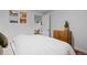 Cozy bedroom featuring hardwood floors and bright natural light at 8190 Raleigh Pl, Westminster, CO 80031
