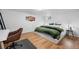 Bedroom featuring modern desk and dark hardwood floors at 8190 Raleigh Pl, Westminster, CO 80031