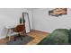 Bedroom featuring modern desk and hardwood floors at 8190 Raleigh Pl, Westminster, CO 80031