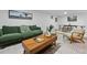 Bright living room features a modern design, a coffee table, and an area rug at 8190 Raleigh Pl, Westminster, CO 80031
