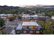 Aerial view of the home and its surrounding neighborhood, showcasing the building's rooftop deck and streetscape at 2010 Pearl St # B, Boulder, CO 80302