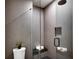 Modern bathroom features a glass shower, tile floors, and sleek design at 2010 Pearl St # B, Boulder, CO 80302