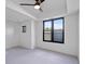Bright, spacious bedroom with large windows and neutral carpet at 2010 Pearl St # B, Boulder, CO 80302