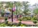 View of Downtown with bustling pedestrian activity, mature trees, flower baskets and quaint street lamps at 2010 Pearl St # B, Boulder, CO 80302