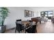 An entertainment area boasts a foosball table, dining set, and a view to the open-concept living area at 2010 Pearl St # B, Boulder, CO 80302