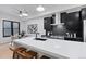 Bright kitchen with stainless steel appliances, a large island, and a dining area nearby at 2010 Pearl St # B, Boulder, CO 80302