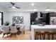 Spacious kitchen and dining area featuring a large island with seating and stainless steel appliances at 2010 Pearl St # B, Boulder, CO 80302