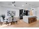 Open-concept kitchen and dining area featuring modern finishes and stainless steel appliances at 2010 Pearl St # B, Boulder, CO 80302