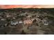 Aerial view showcasing a beautiful home nestled among mature trees in a peaceful neighborhood at 265 Ox Yoke Way, Monument, CO 80132