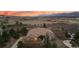 Sprawling ranch-style home on acreage offers mature landscaping and mountain views at 265 Ox Yoke Way, Monument, CO 80132