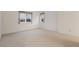 Bright, neutral bedroom featuring scenic view from windows with sheer curtains at 265 Ox Yoke Way, Monument, CO 80132