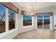 Kitchen nook features windows and sliding door with mountain views and hardwood floors at 265 Ox Yoke Way, Monument, CO 80132
