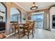 Breakfast nook with a round table, chairs, and a sliding glass door providing natural light and outdoor access at 11020 E 150Th Pl, Brighton, CO 80602