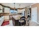 Well-equipped kitchen featuring granite countertops, custom cabinetry, and stainless steel appliances at 11020 E 150Th Pl, Brighton, CO 80602