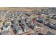 A beautiful aerial view of multiple homes in a residential area showcasing a well-planned community at 4407 N Quemoy St, Aurora, CO 80019