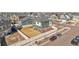 Beautiful aerial view of a home showcasing its lush backyard and prime location within a vibrant neighborhood at 4407 N Quemoy St, Aurora, CO 80019