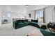 Spacious living room showcasing comfortable seating, bright natural light at 4407 N Quemoy St, Aurora, CO 80019
