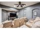 Home theater featuring tiered seating, recessed lighting, and a large flat screen television at 4185 Cheyenne Dr, Larkspur, CO 80118