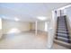 Spacious finished basement with carpet flooring, a drop ceiling, and bright neutral walls at 11397 Kendall St, Westminster, CO 80020