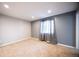 Neutral bedroom features carpet flooring, a window, and neutral paint at 11397 Kendall St, Westminster, CO 80020
