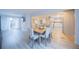 Dining room with open floor plan, leading to living room, kitchen, and backyard at 11397 Kendall St, Westminster, CO 80020