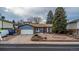 Charming single-story home with a well-maintained front yard and an attached two-car garage at 11397 Kendall St, Westminster, CO 80020
