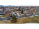 Aerial view of neighborhood street with cars parked at 11397 Kendall St, Westminster, CO 80020