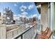 Inviting balcony with chairs and cityscape views at 891 14Th St # 2002, Denver, CO 80202