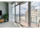 Capture the city skyline from the balcony, accessible through large sliding glass doors, blending indoor-outdoor living at 891 14Th St # 2002, Denver, CO 80202