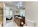 This modern bathroom showcases dual sinks, granite countertops, and easy access to the main bedroom at 891 14Th St # 2002, Denver, CO 80202