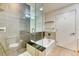 Modern bathroom features a glass shower, separate tub, and sleek tile work at 891 14Th St # 2002, Denver, CO 80202