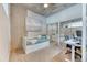 Charming bedroom featuring a bed, art, and sliding glass door leading to an office area at 891 14Th St # 2002, Denver, CO 80202