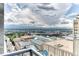 Expansive city skyline view with mountain backdrop and dramatic sky at 891 14Th St # 2002, Denver, CO 80202