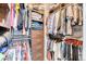 Spacious walk-in closet with custom shelving and hanging rods for optimal organization at 891 14Th St # 2002, Denver, CO 80202