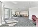 Inviting common area featuring tables, seating, and a kitchenette for resident use at 891 14Th St # 2002, Denver, CO 80202