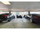 Spacious parking garage featuring assigned parking spaces and a variety of vehicles, offering secure and convenient parking at 891 14Th St # 2002, Denver, CO 80202