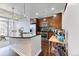 Modern kitchen with stainless steel appliances, granite countertops, and a large island at 891 14Th St # 2002, Denver, CO 80202