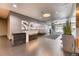 Stylish lobby featuring a sleek reception desk, modern art, comfortable seating, and elegant decor that welcomes visitors at 891 14Th St # 2002, Denver, CO 80202