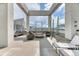 Inviting rooftop lounge area with modern seating and a cozy fire pit at 891 14Th St # 2002, Denver, CO 80202