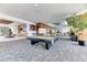 Spacious lounge with a billiards table, modern decor, and an open layout for relaxing and socializing at 891 14Th St # 2002, Denver, CO 80202