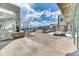 Luxurious rooftop pool area with stunning city views and comfortable lounge seating at 891 14Th St # 2002, Denver, CO 80202