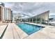 Beautiful rooftop pool with blue tile trim and city views, perfect for relaxation and entertainment at 891 14Th St # 2002, Denver, CO 80202