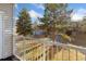 Balcony view overlooking trees and a pond at 1150 Golden Cir # 201, Golden, CO 80401