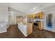 Modern kitchen with stainless steel appliances and wood cabinets at 9451 Ashbury Cir # 202, Parker, CO 80134